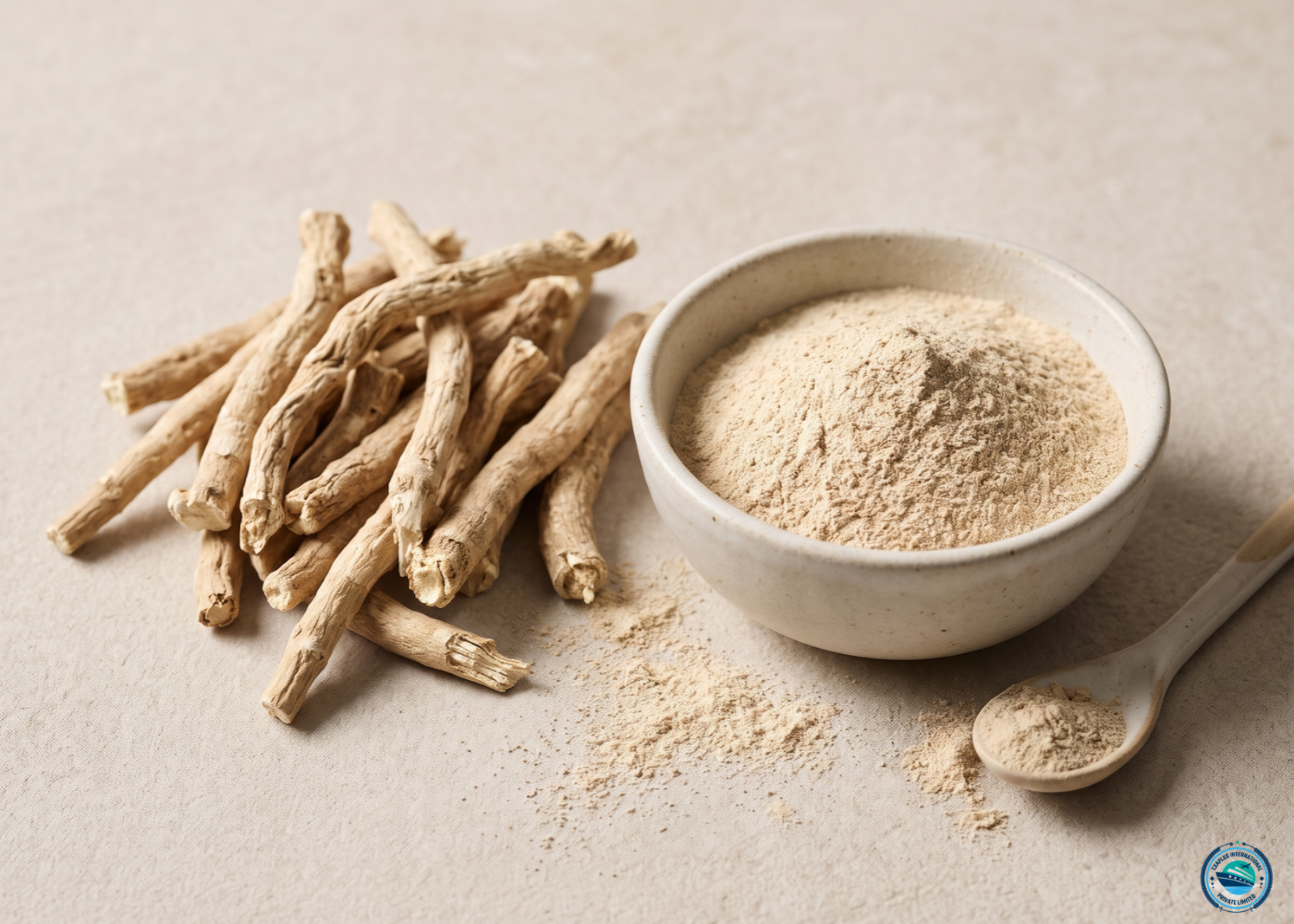 Bowl of ashwagandha root powder beside dried ashwagandha roots on linen